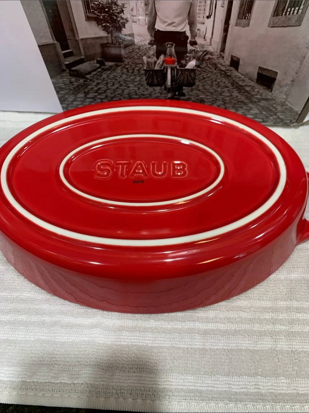 Staub Red Oval Ceramic Casserole with Cream Interior